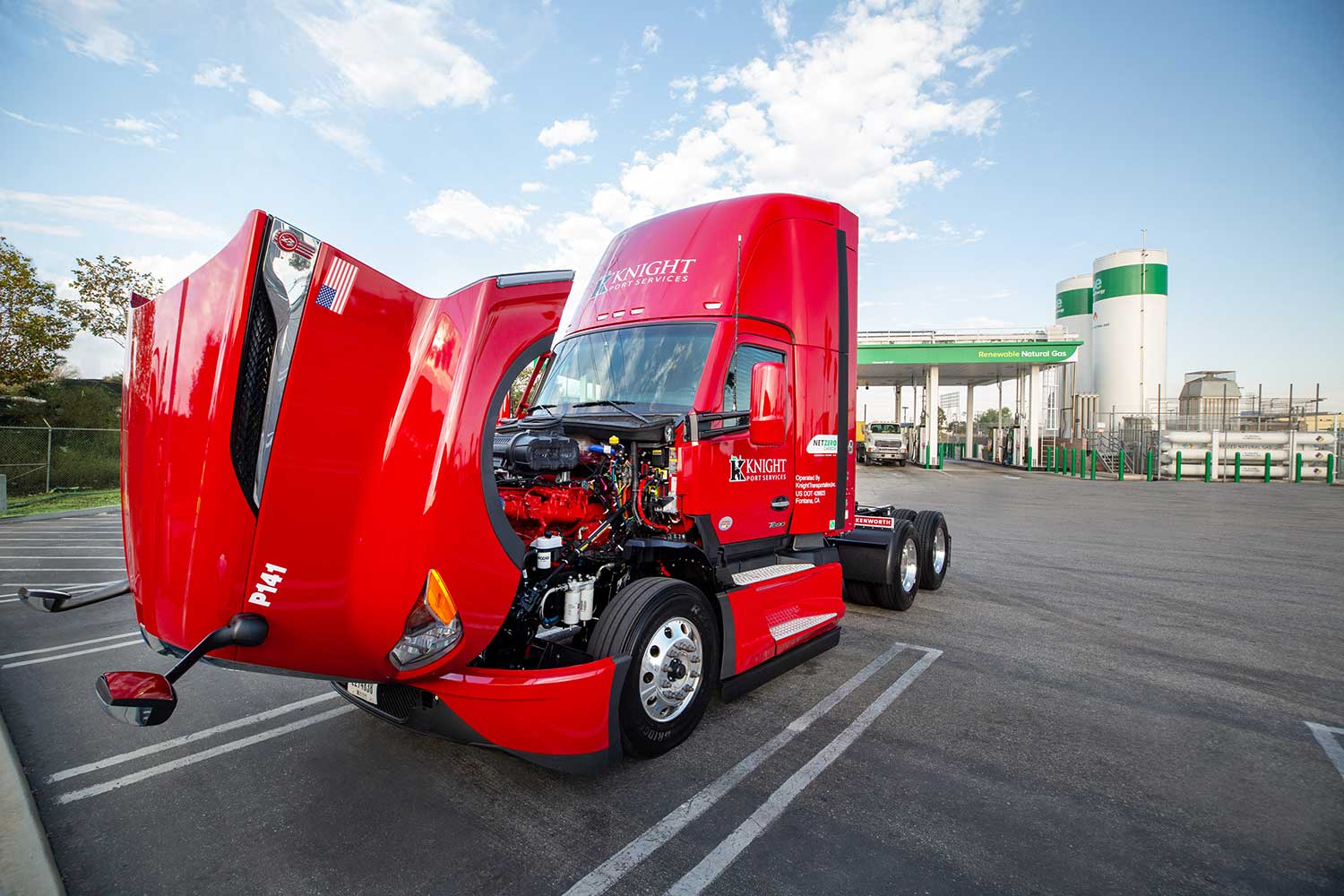 Knight Transportation semi-truck tractor with hood open