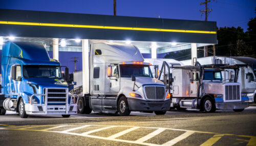 Trucks at a truck stop. Truck stop etiquette for truck drivers